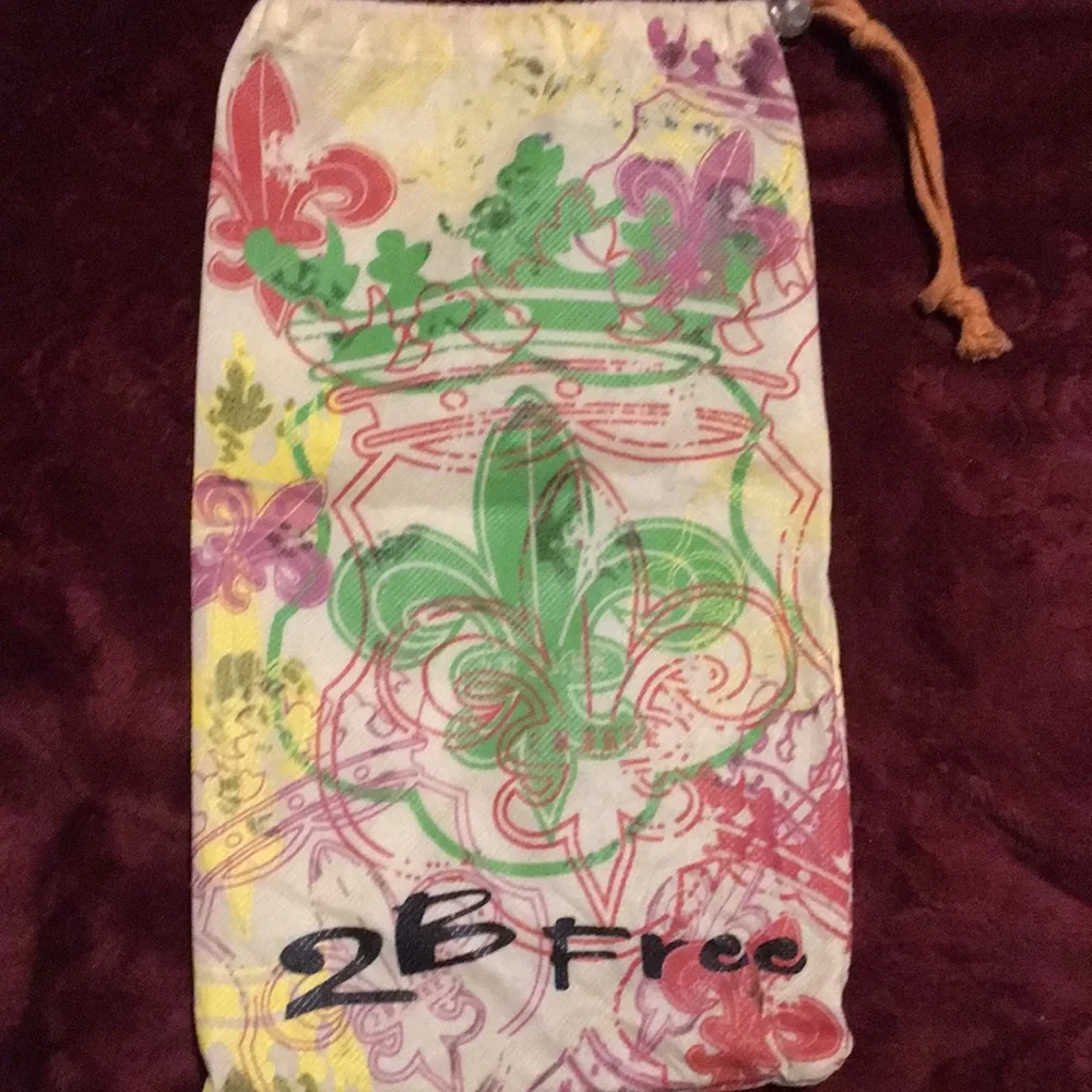 DUST BAG Fleur de lis  13” inches high and 7”inches across wide